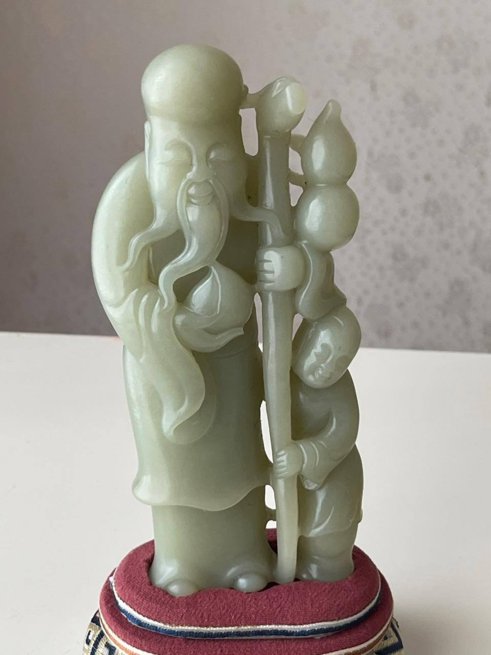 和田玉海尼拉克黄白老肉种寿星摇件