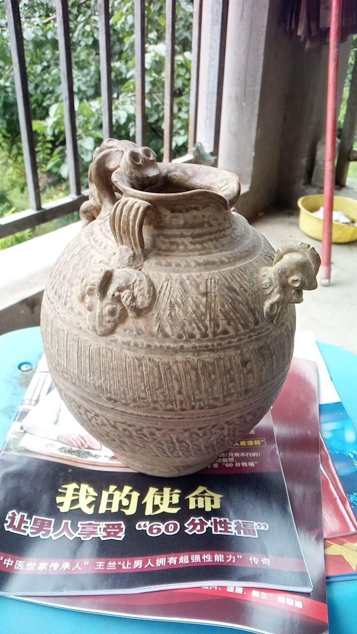 青瓷鸡首双系陶罐